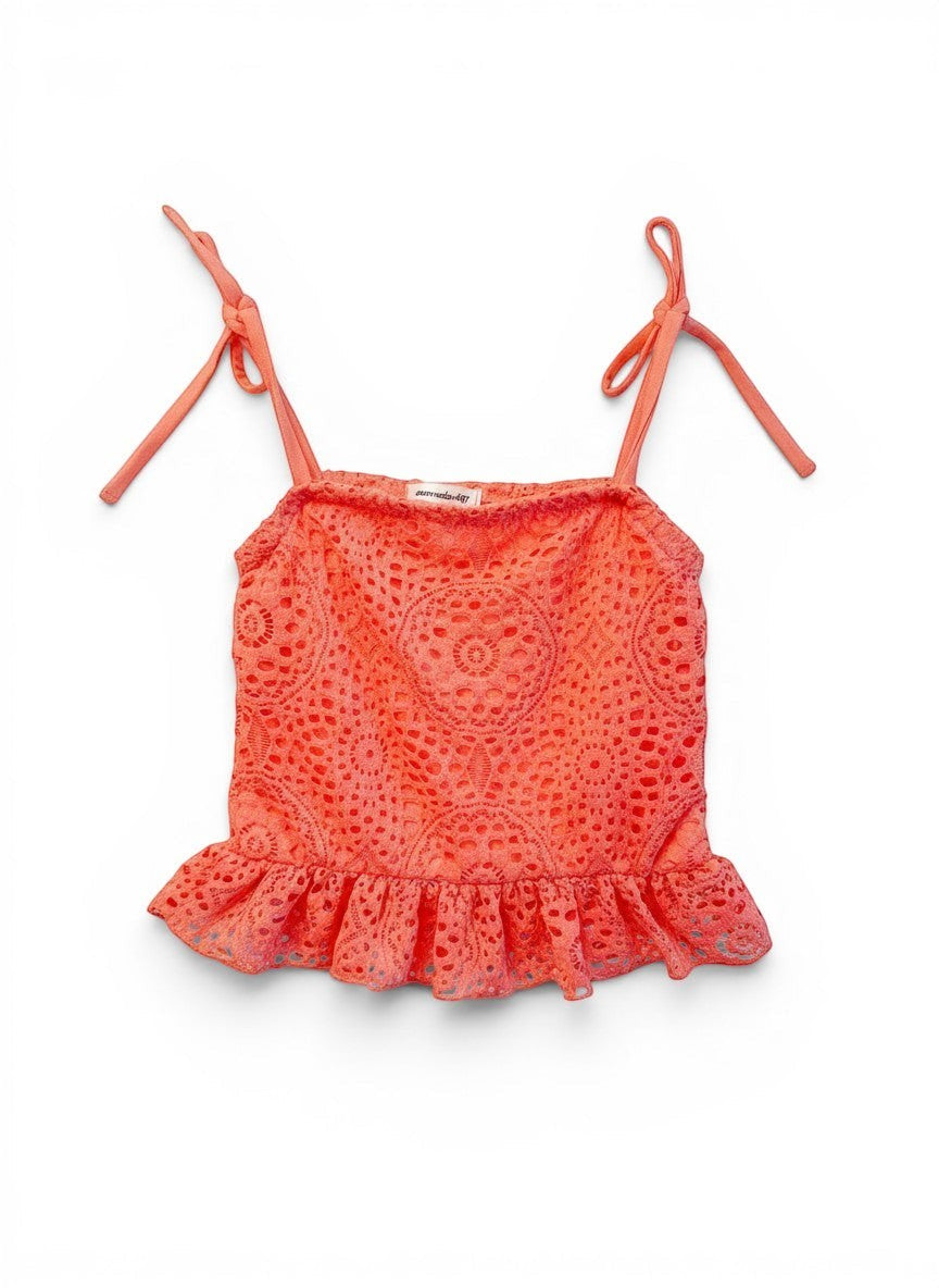 Vann & Liv Area Code 407 coral crochet spaghetti strap top with tie shoulders and ruffled hem.