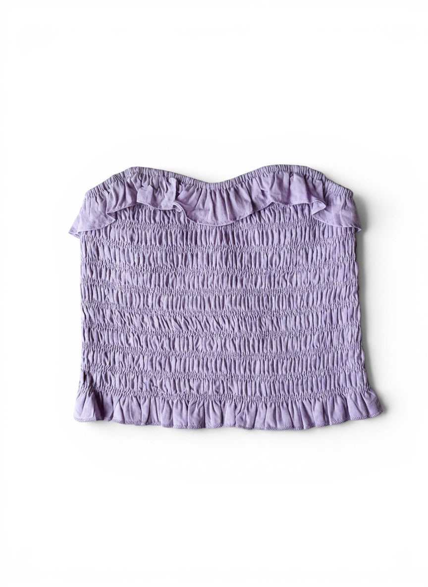 Vann & Liv light purple smocked tube top with ruffle trim at the neckline and hem.