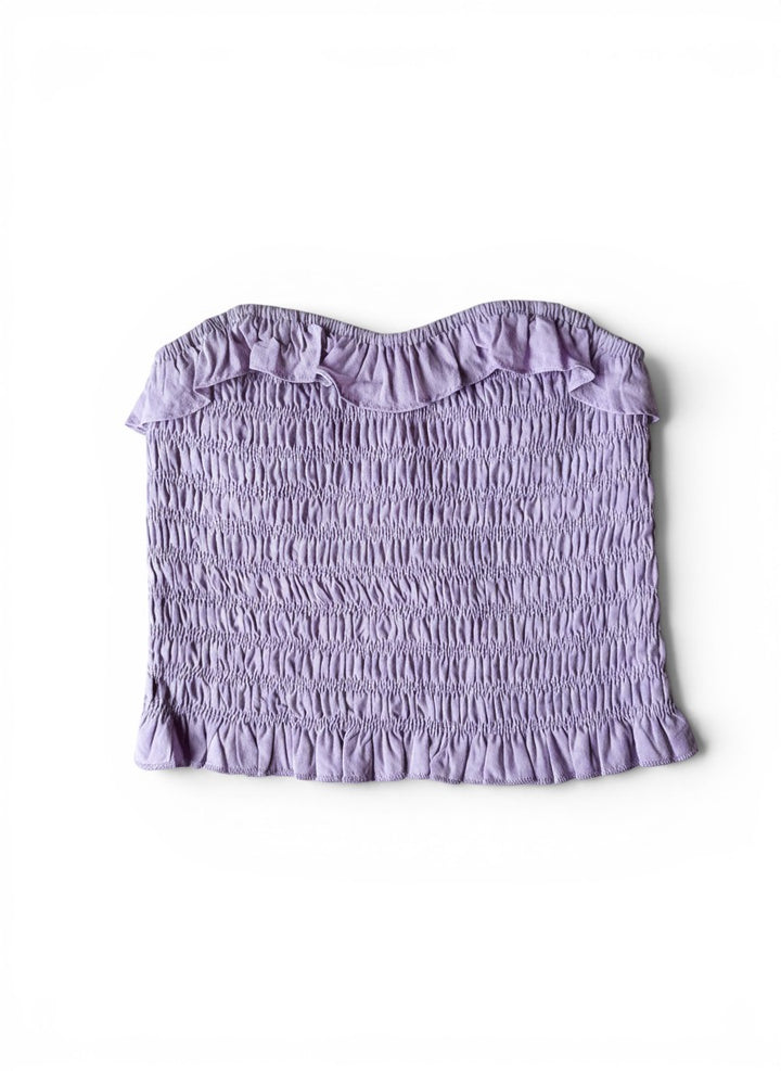Vann &amp; Liv light purple smocked tube top with ruffle trim at the neckline and hem.