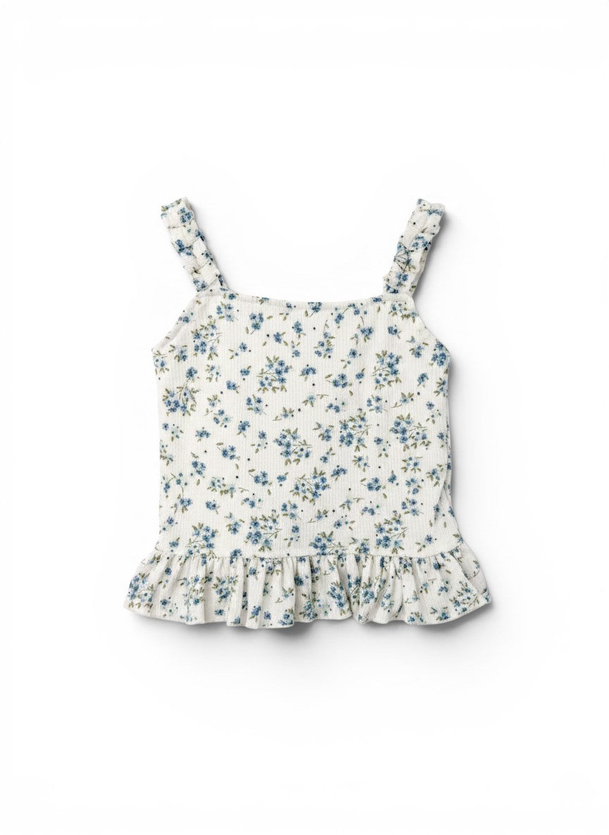 Vann & Liv white floral print ruffle tank top with blue flowers and green leaves, featuring ruffled straps and hem.