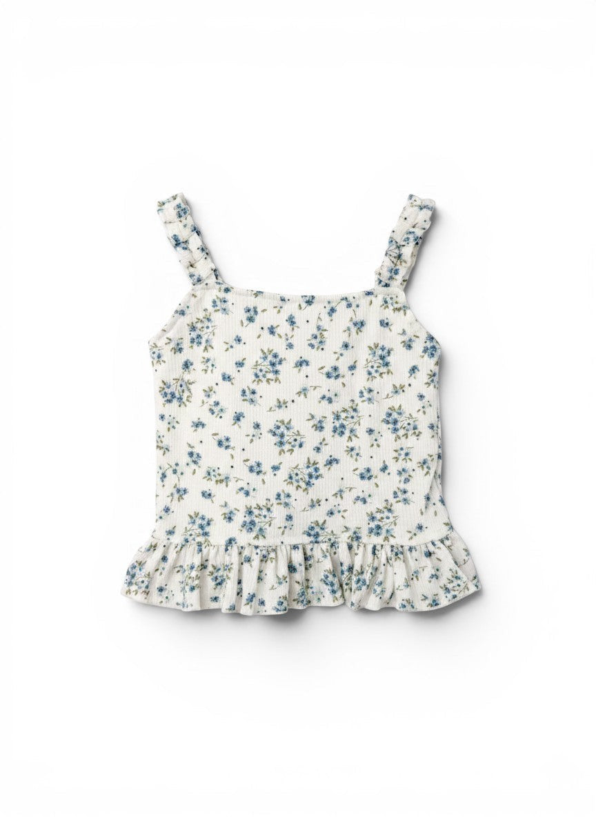 Vann & Liv white floral print ruffle tank top with blue flowers and green leaves, featuring ruffled straps and hem.